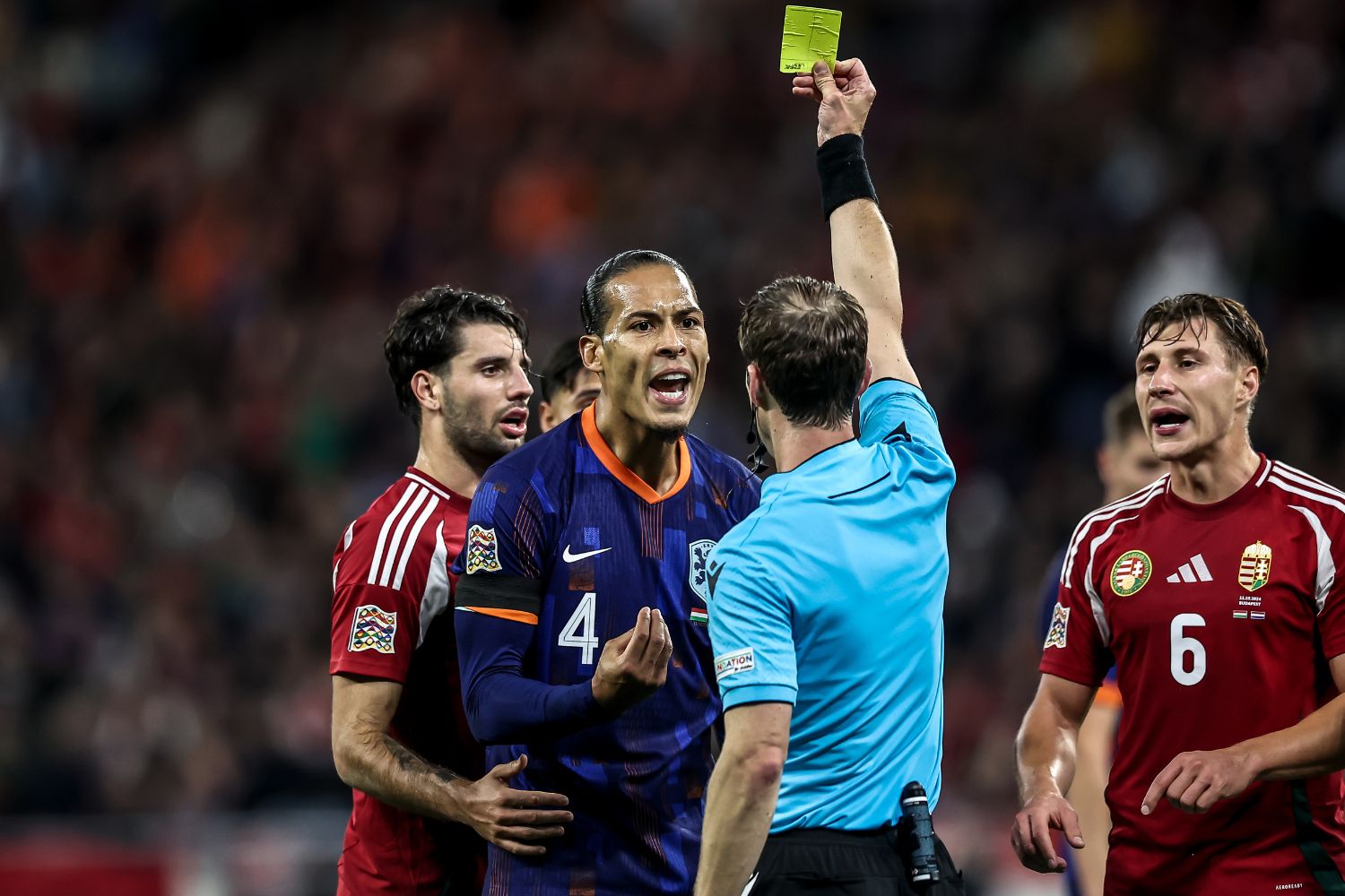 Van Dijk's first yellow card against Hungary before being sent off for the Netherlands