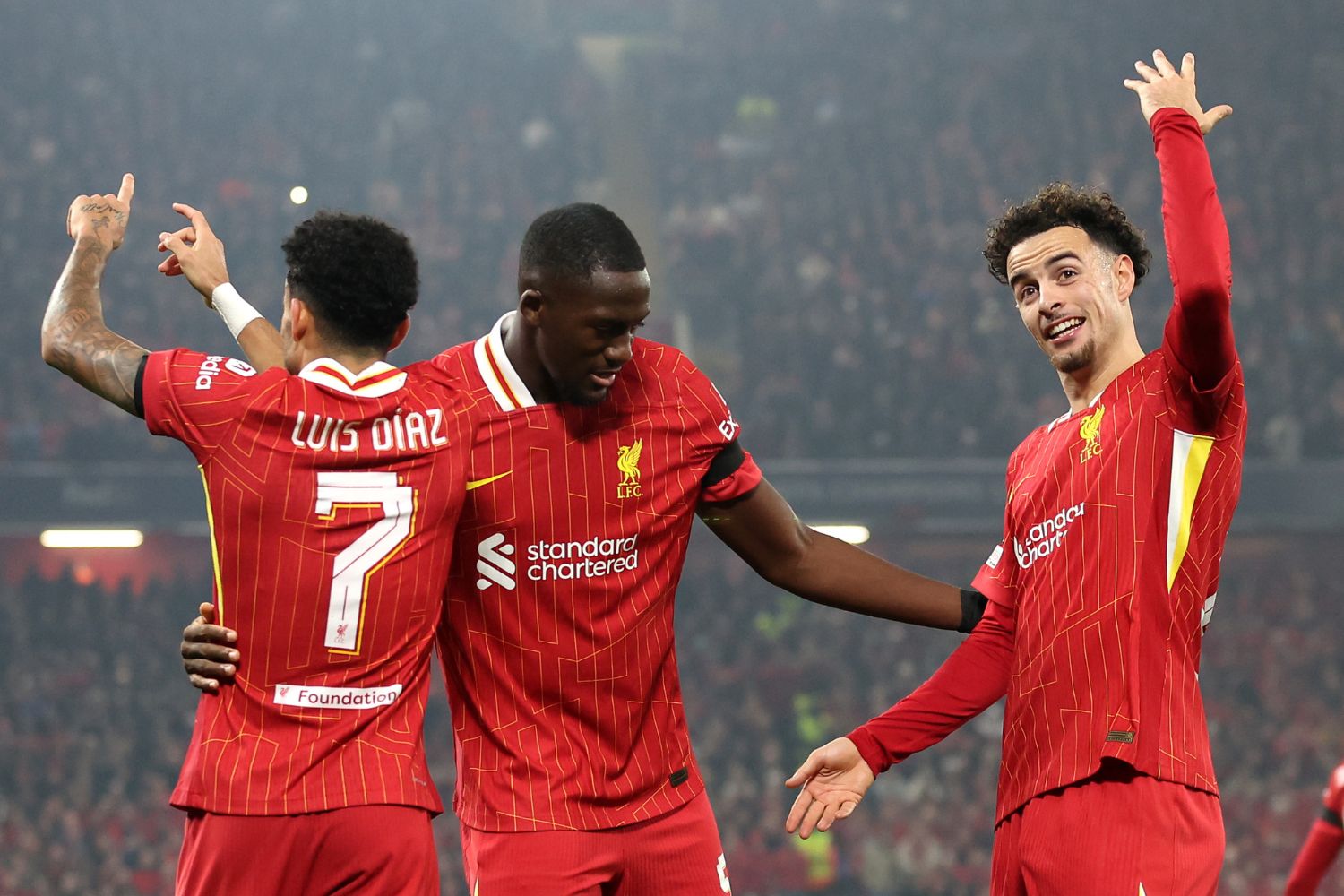 Ibou Konate celebrates with Diaz and Jones