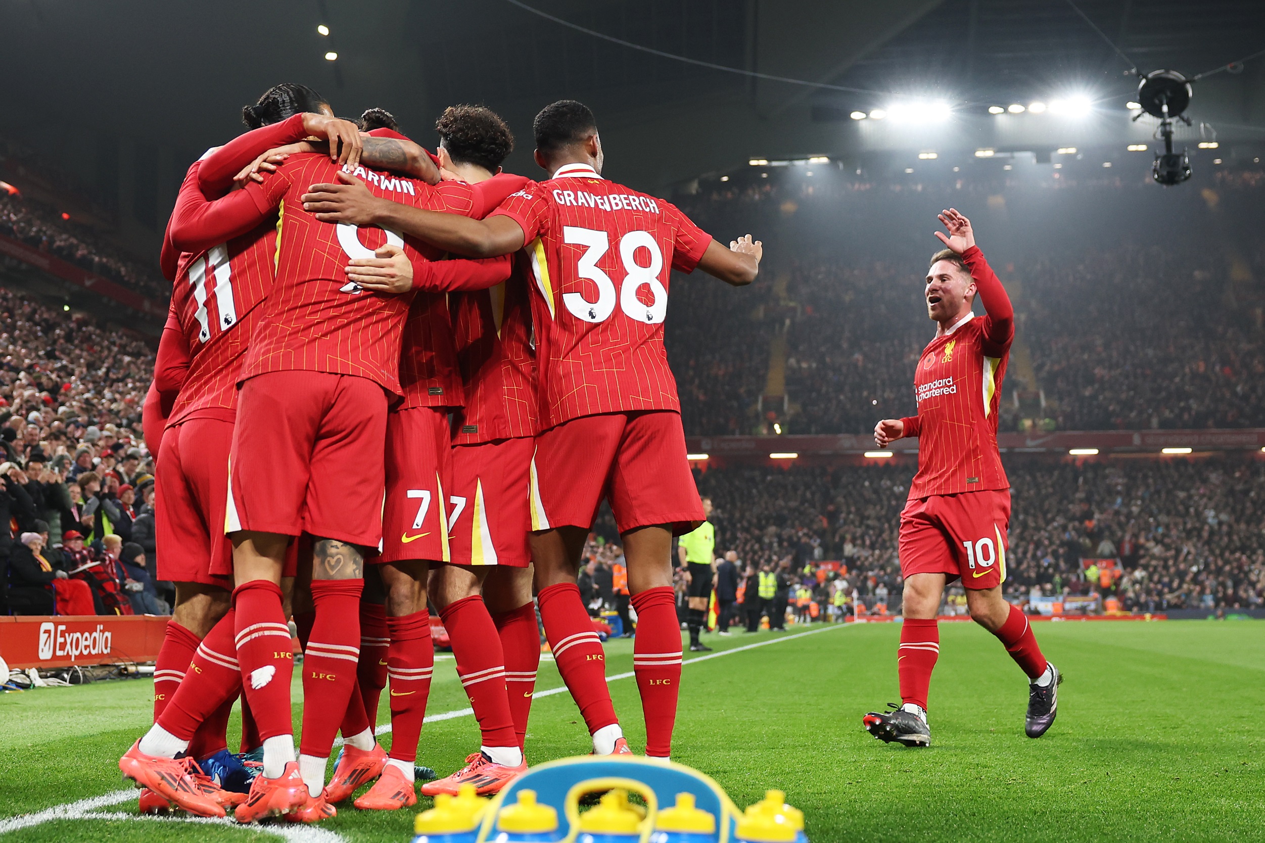 Darwin Nunez celebrates with his Liverpool teammates after scoring first against Aston Villa.