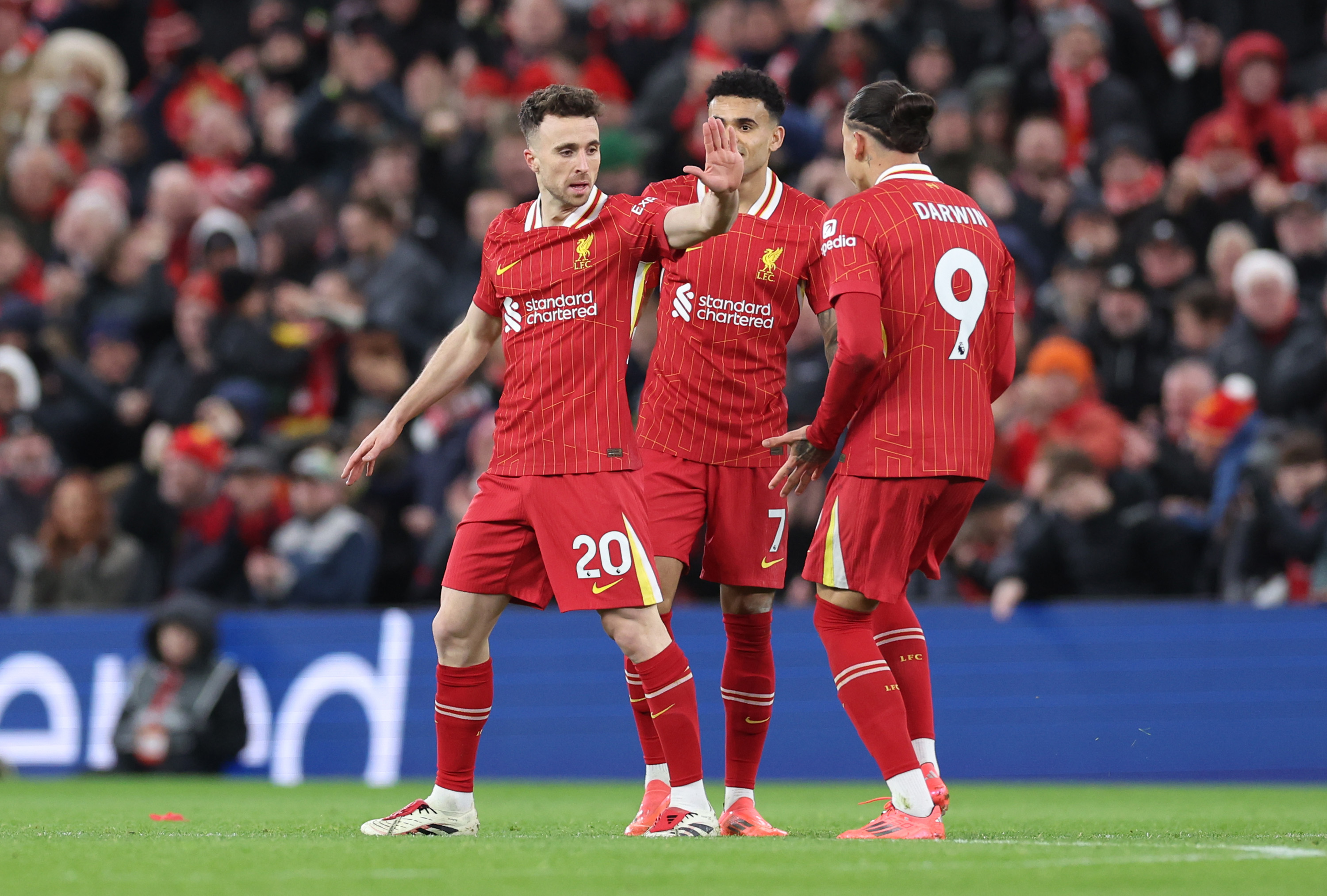Diogo Jota celebrates with Luis Diaz and Darwin Nunez