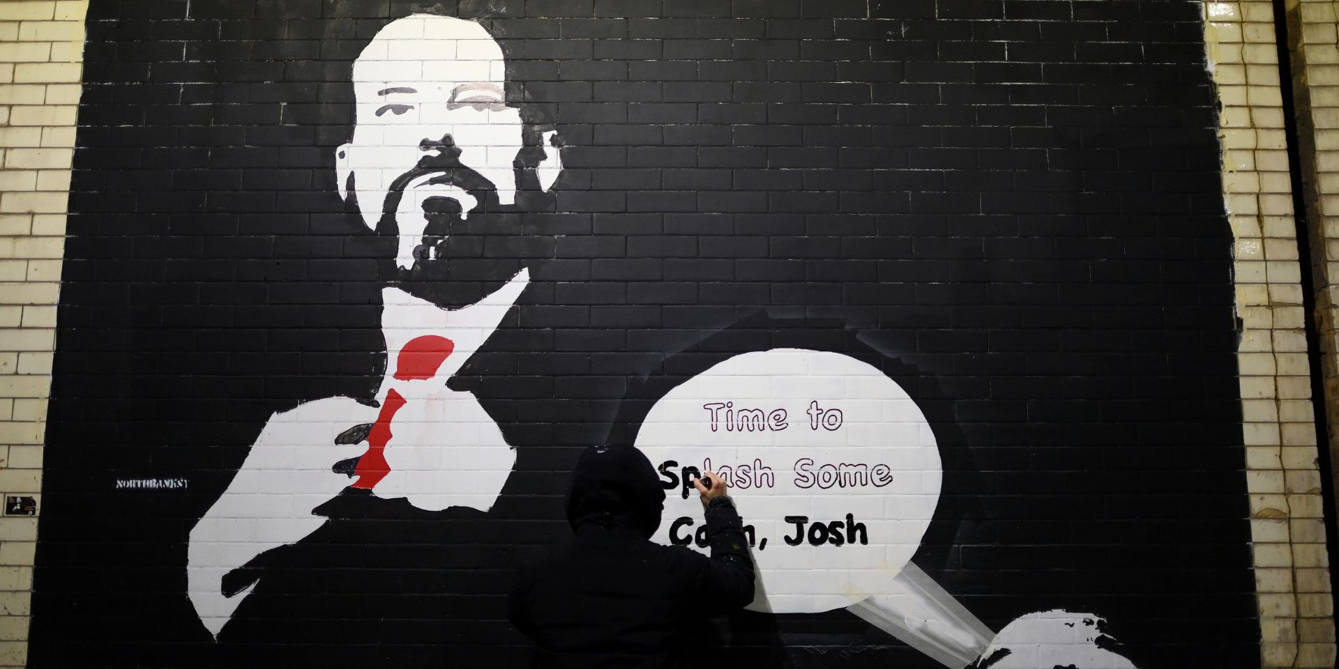 Arsenal mural of Josh Kroenke