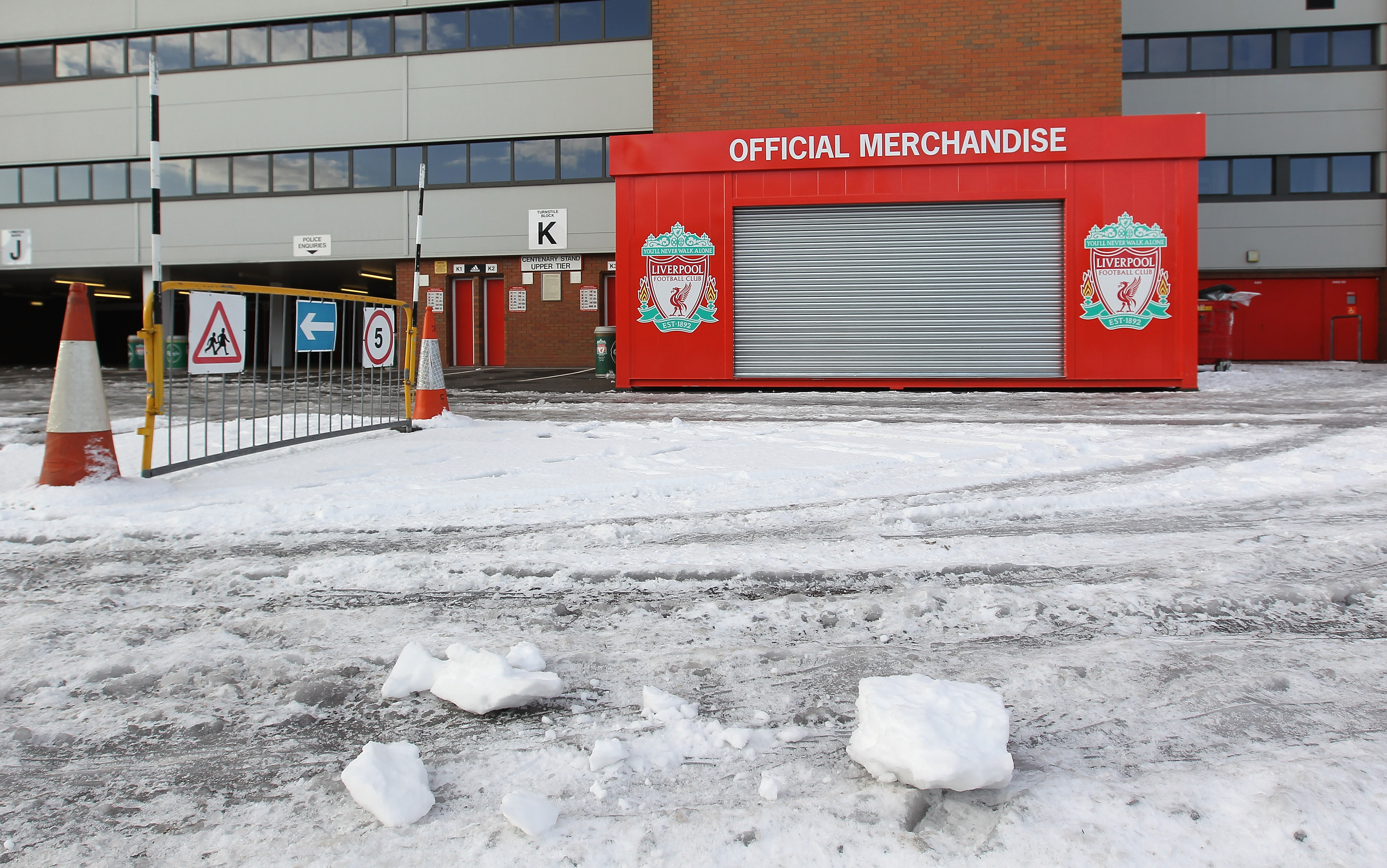 Liverpool's match against Man United is at risk of being postponed due to an amber weather warning