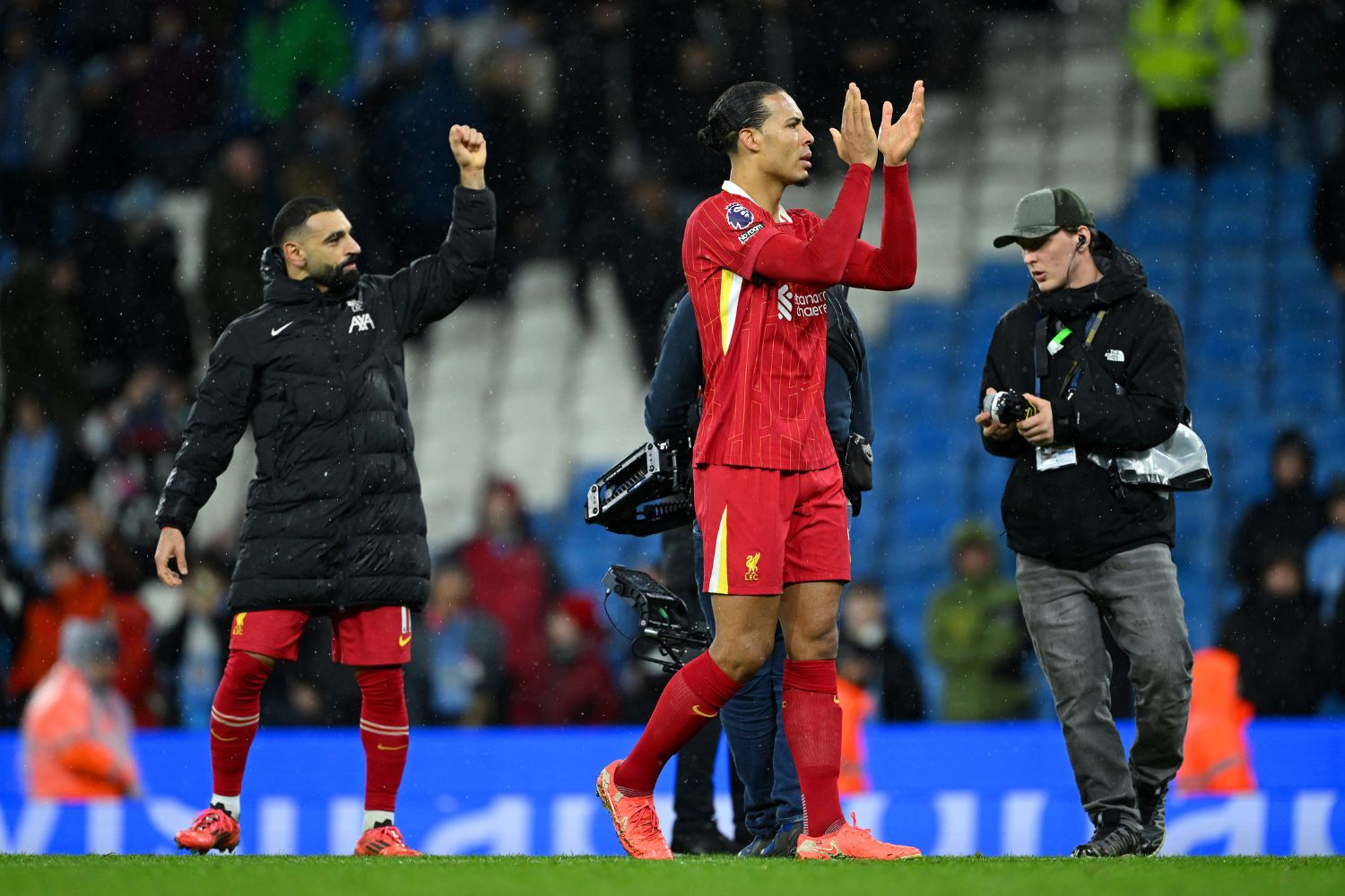 Virgil van Dijk celebrates at the Etihad Stadium