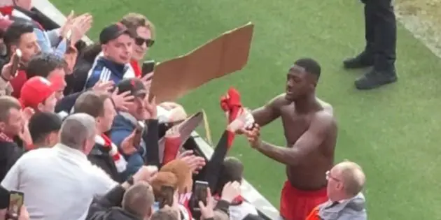 Ibou Konate gives his shirt to Liverpool fans