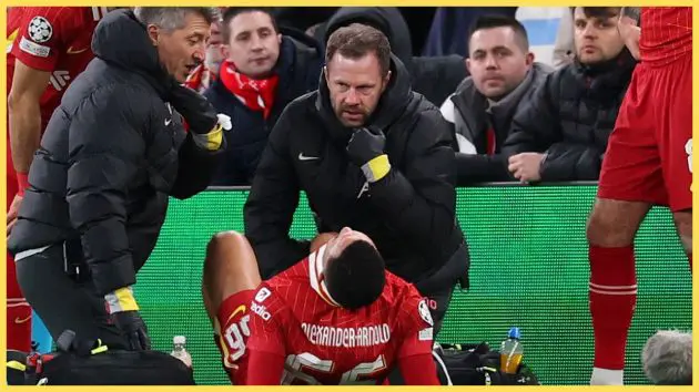 Trent Alexander Arnold grimaces whilst receiving medical treatment.