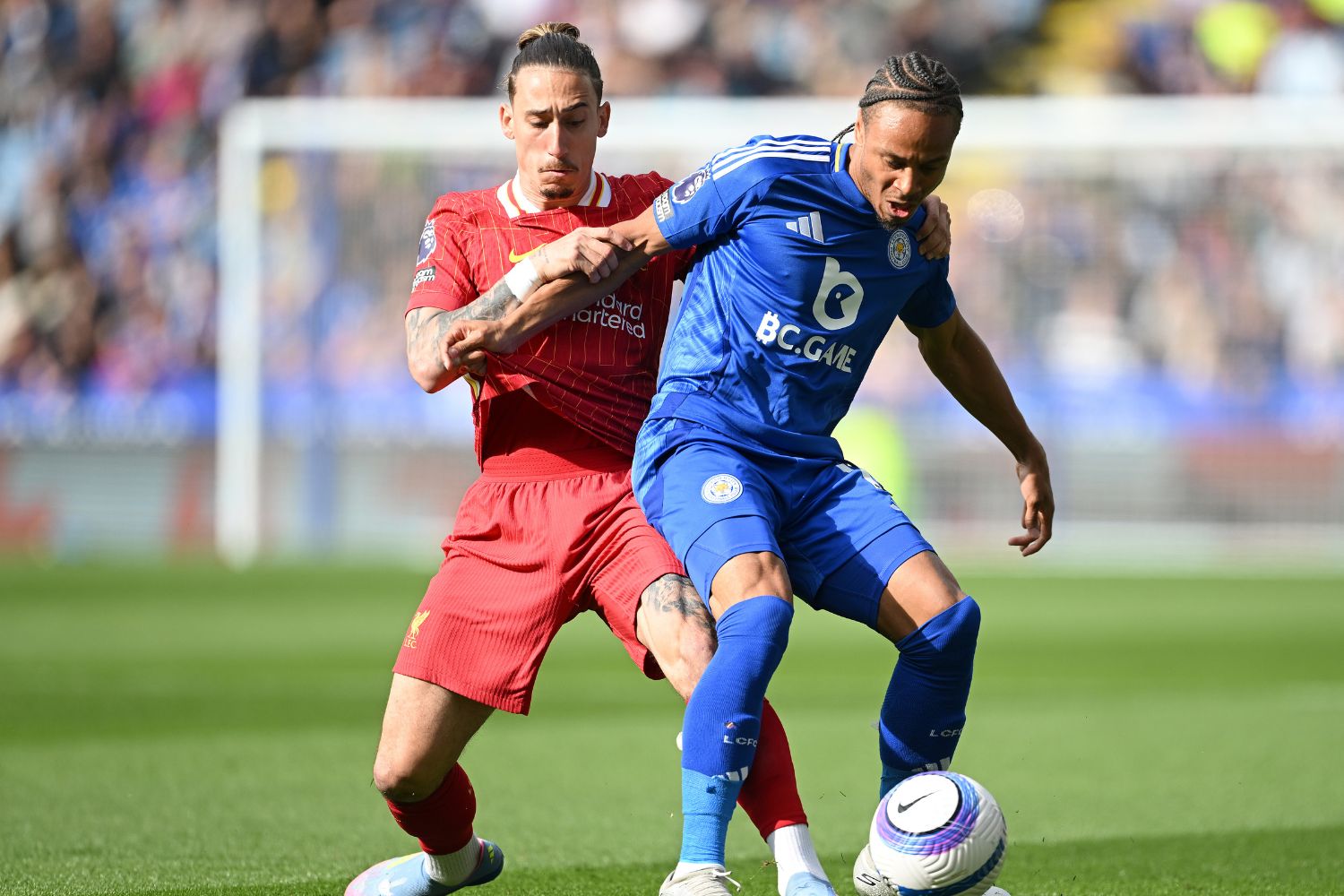 Kostas Tsimikas in action against Leicester City