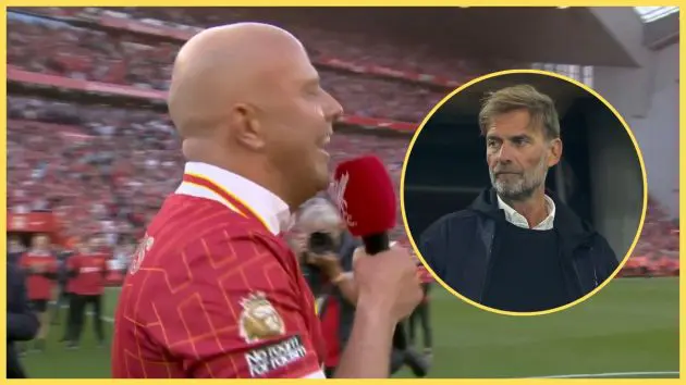 Arne Slot holds a microphone next to Jurgen Klopp.