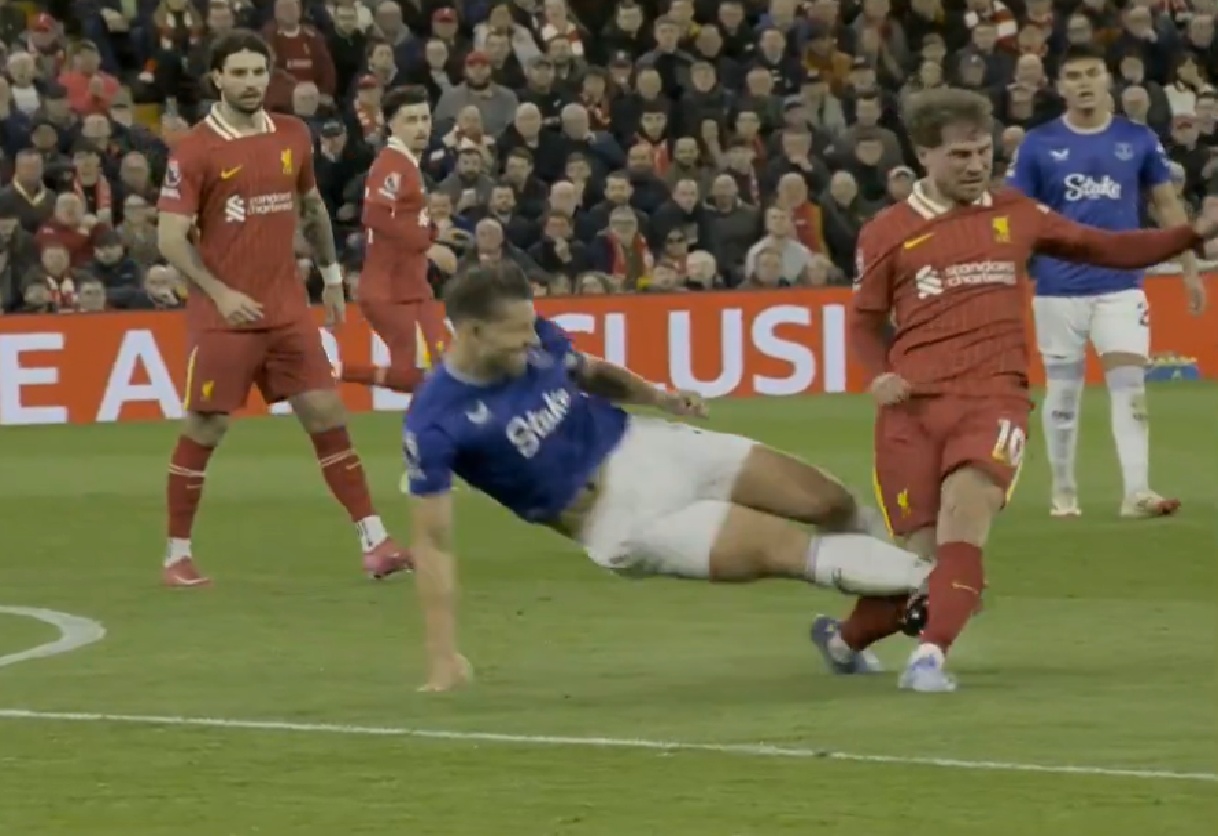 James Tarkowski avoided a red card for this lunge on Alexis Mac Allister