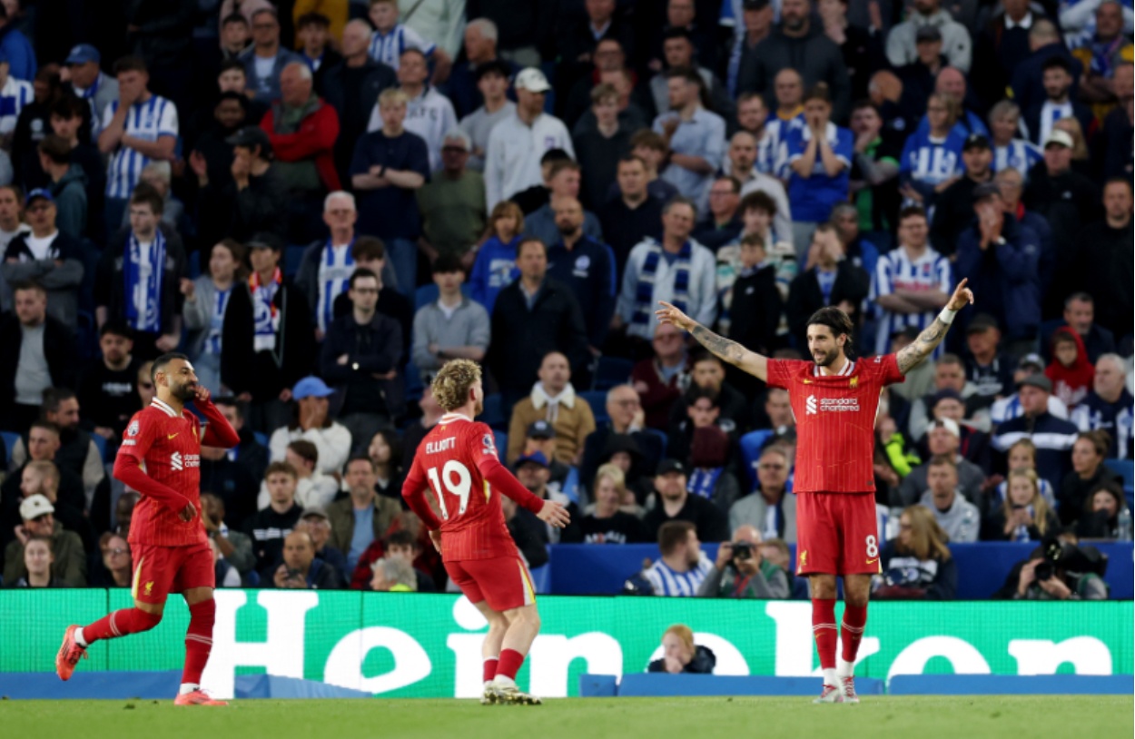 Dominik Szoboszlai celebrates his goal against Brighton, which left Arne Slot stunned