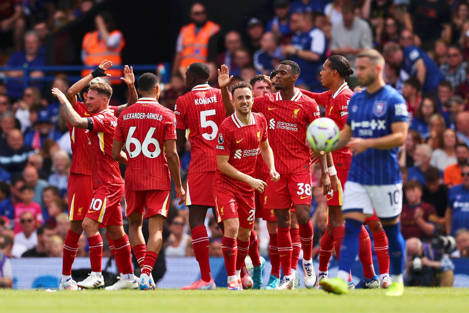 Diogo Jota celebrates with his Liverpool teammates