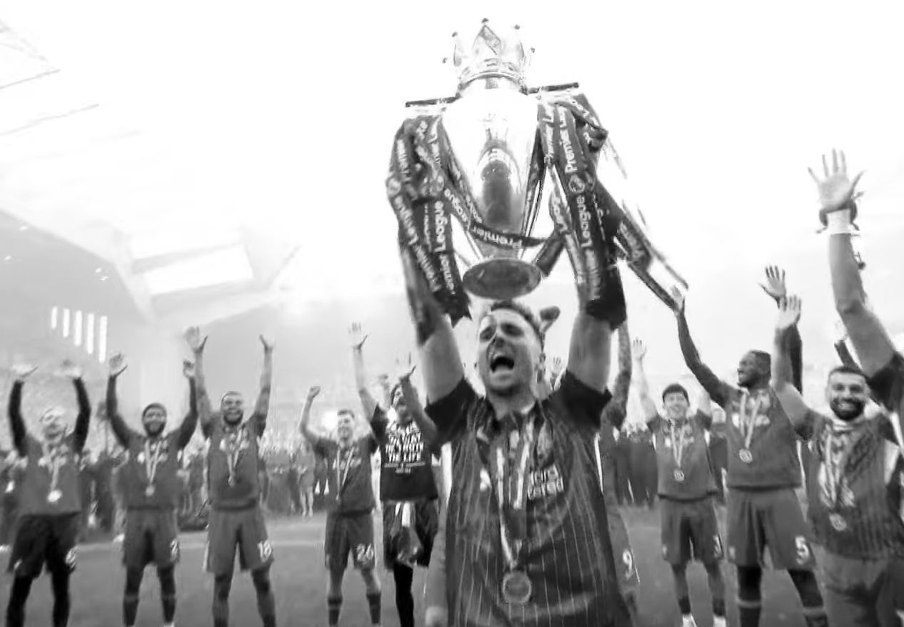 Diogo Jota lifted the Premier League trophy after his final appearance for Liverpool
