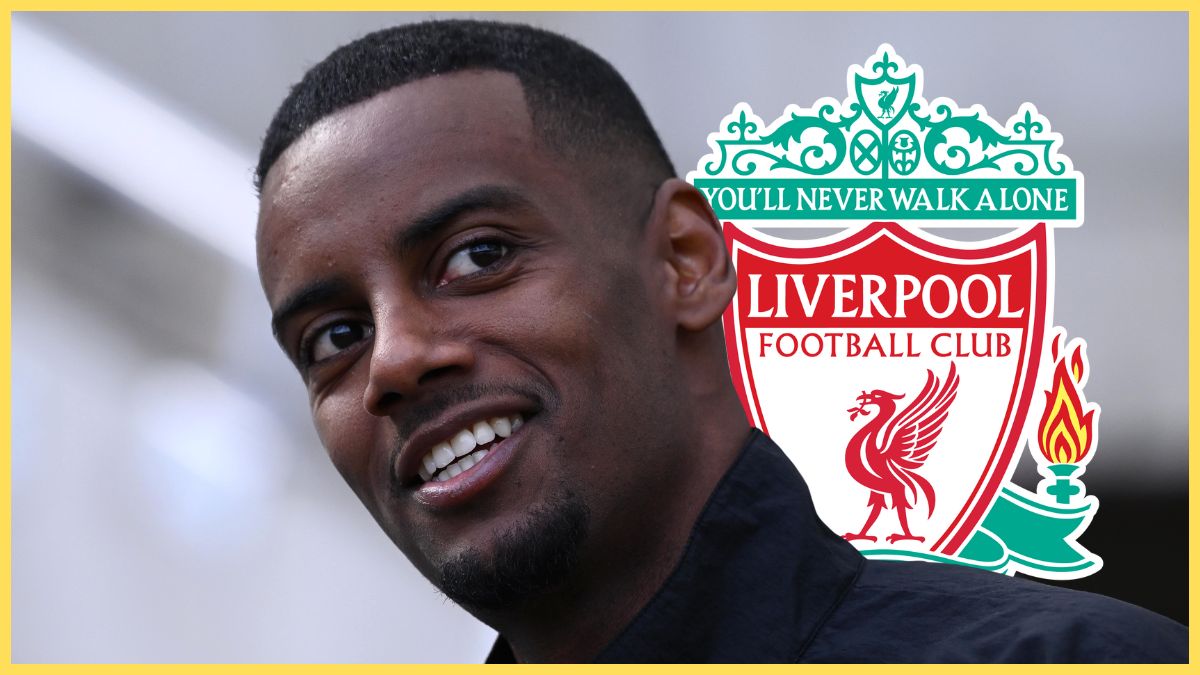 Alexander Isak smiles in front of Liverpool club crest.