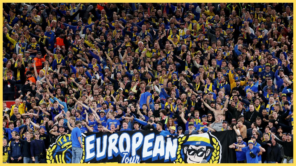 Union Saint-Gilloise fans show their support during the UEFA Europa League match between Liverpool FC and R. Union Saint-Gilloise at Anfield