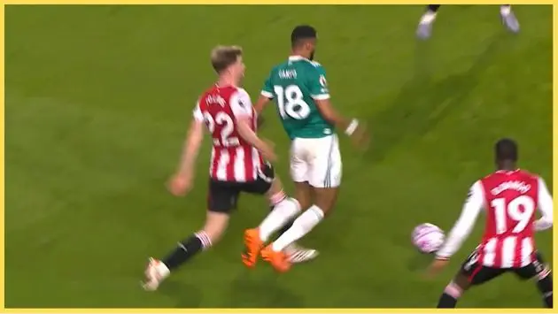Cody Gakpo went down in the penalty area under this challenge from Nathan Collins