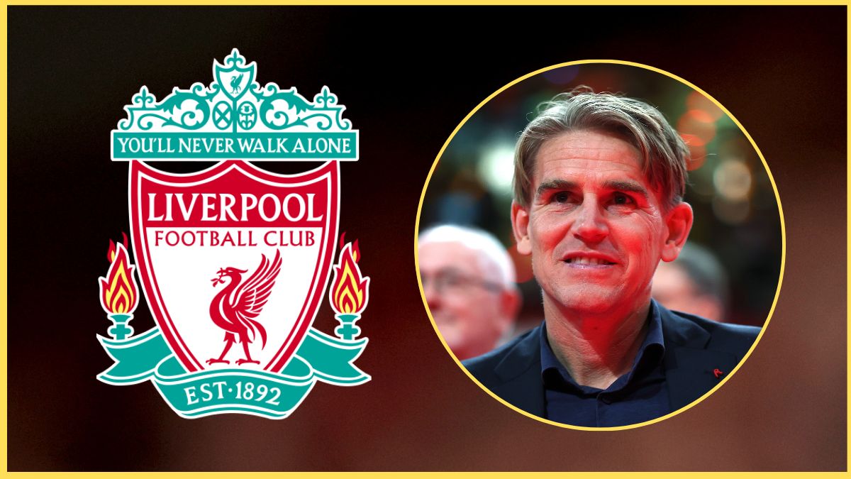 Christoph Freund looks on next to Liverpool club crest.