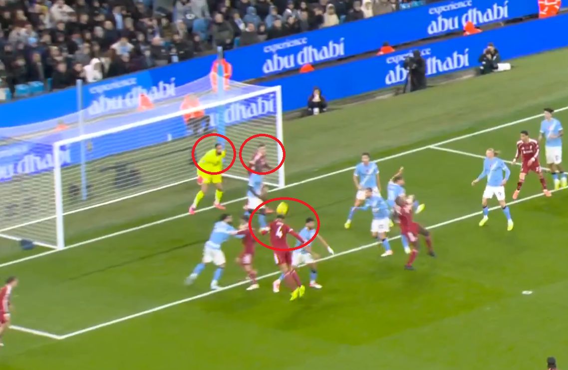 Virgil van Dijk heads the ball towards goal.