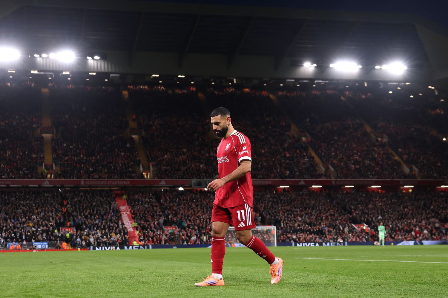 Mo Salah walks to take a corner for Liverpool