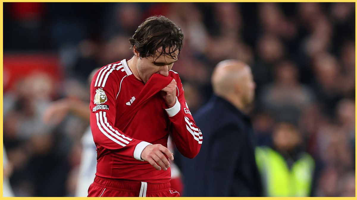 Federico Chiesa reacts at Anfield with Arne Slot in the background