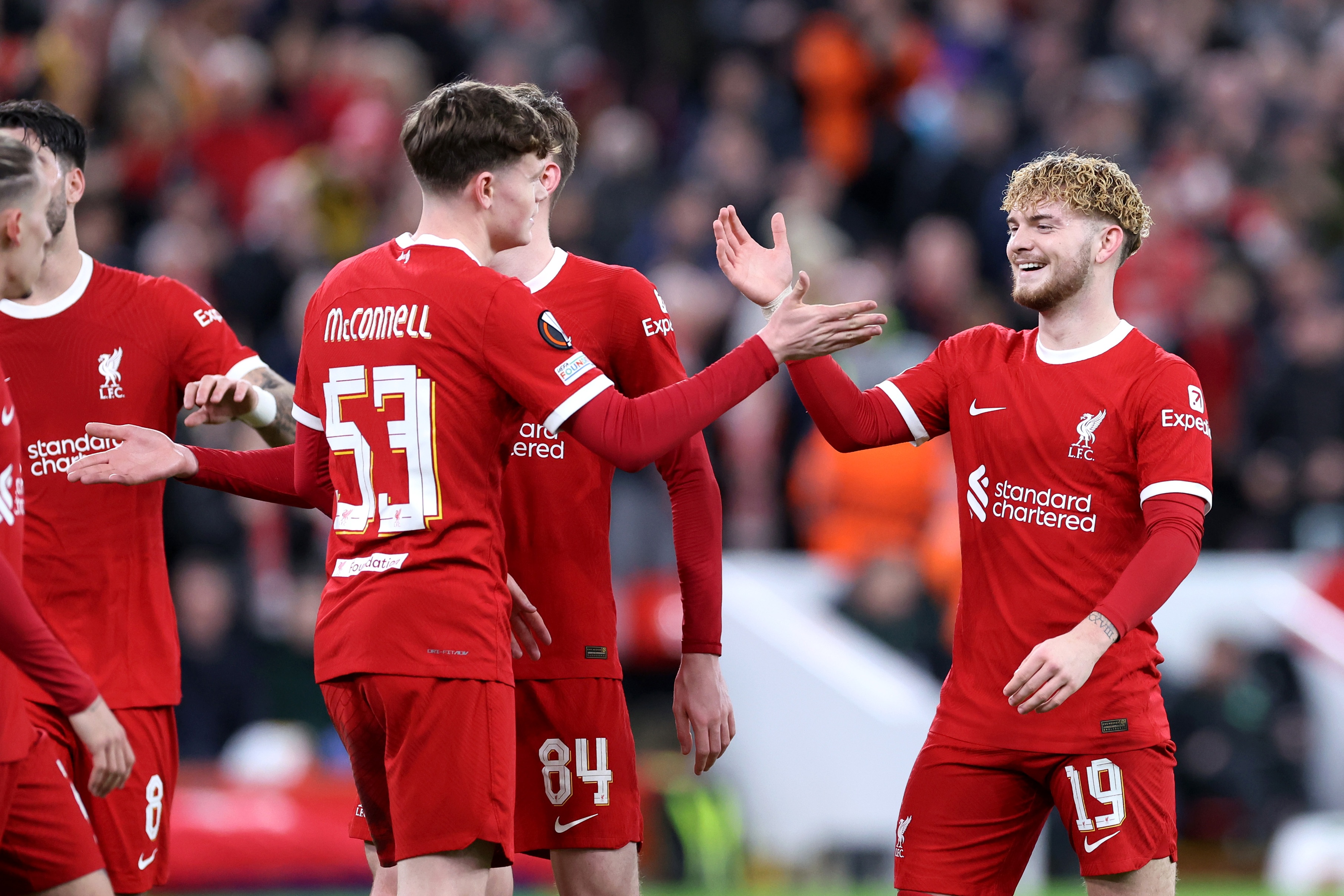 James McConnell high-fives Harvey Elliott.