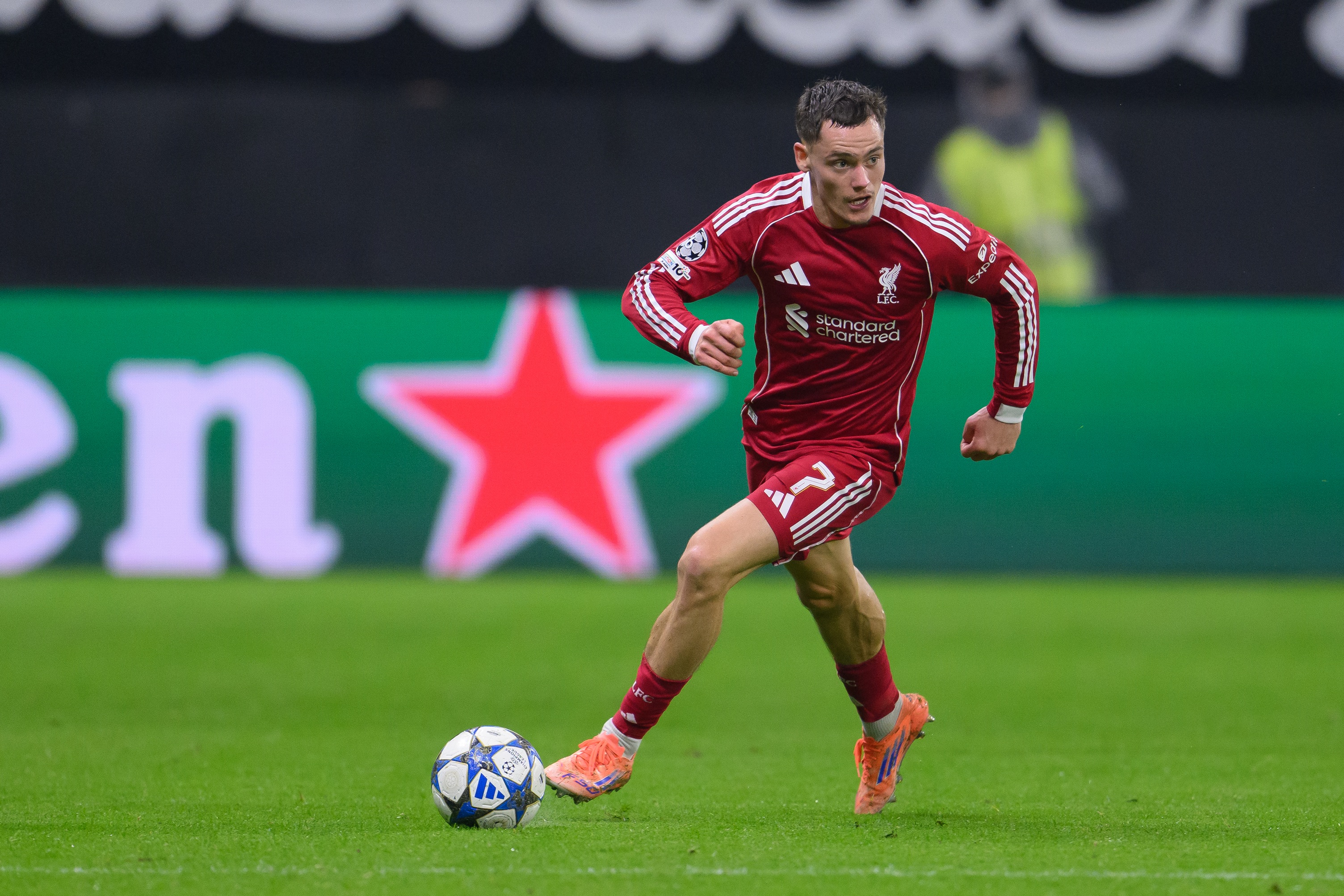 Florian Wirtz dribbles with the ball for Liverpool.