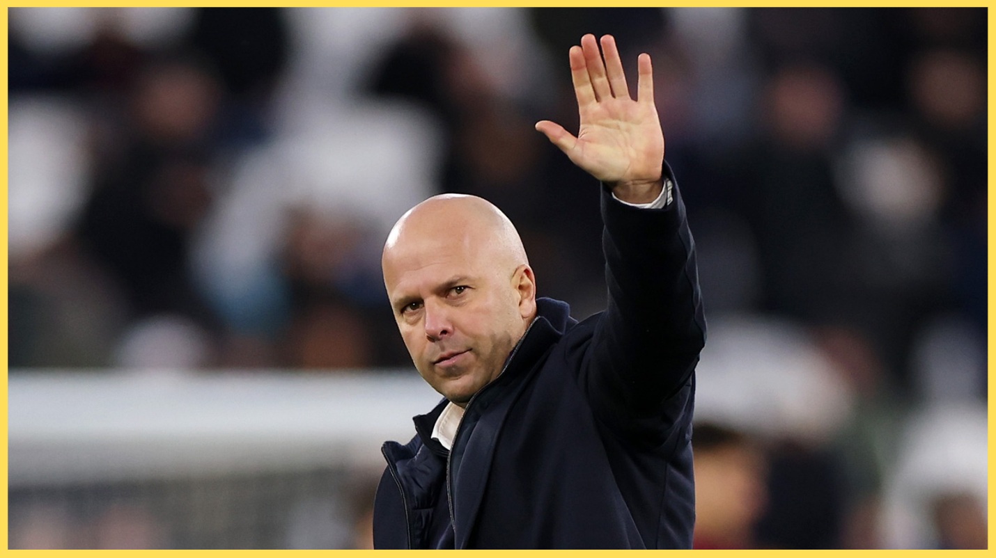 Arne Slot salutes the travelling Liverpool fans after the 2-0 win at West Ham on Sunday