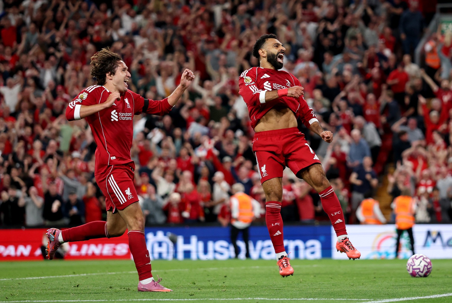 Federico Chiesa celebrates with Mo Salah