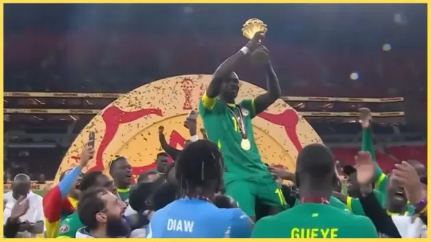 Sadio Mane lifts the AFCON trophy after Senegal beat Morocco in the final