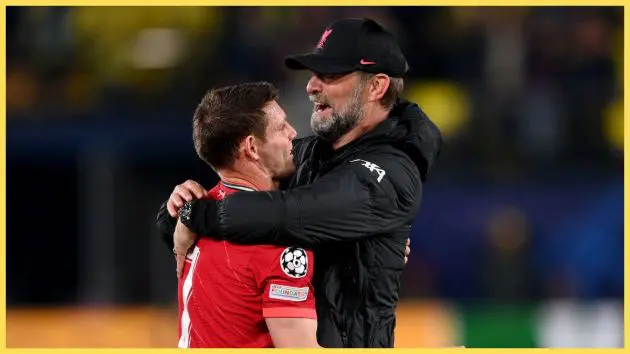 Jurgen Klopp embraces James Milner of Liverpool, in 2022