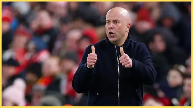 Arne Slot gives a thumbs-up from the touchline