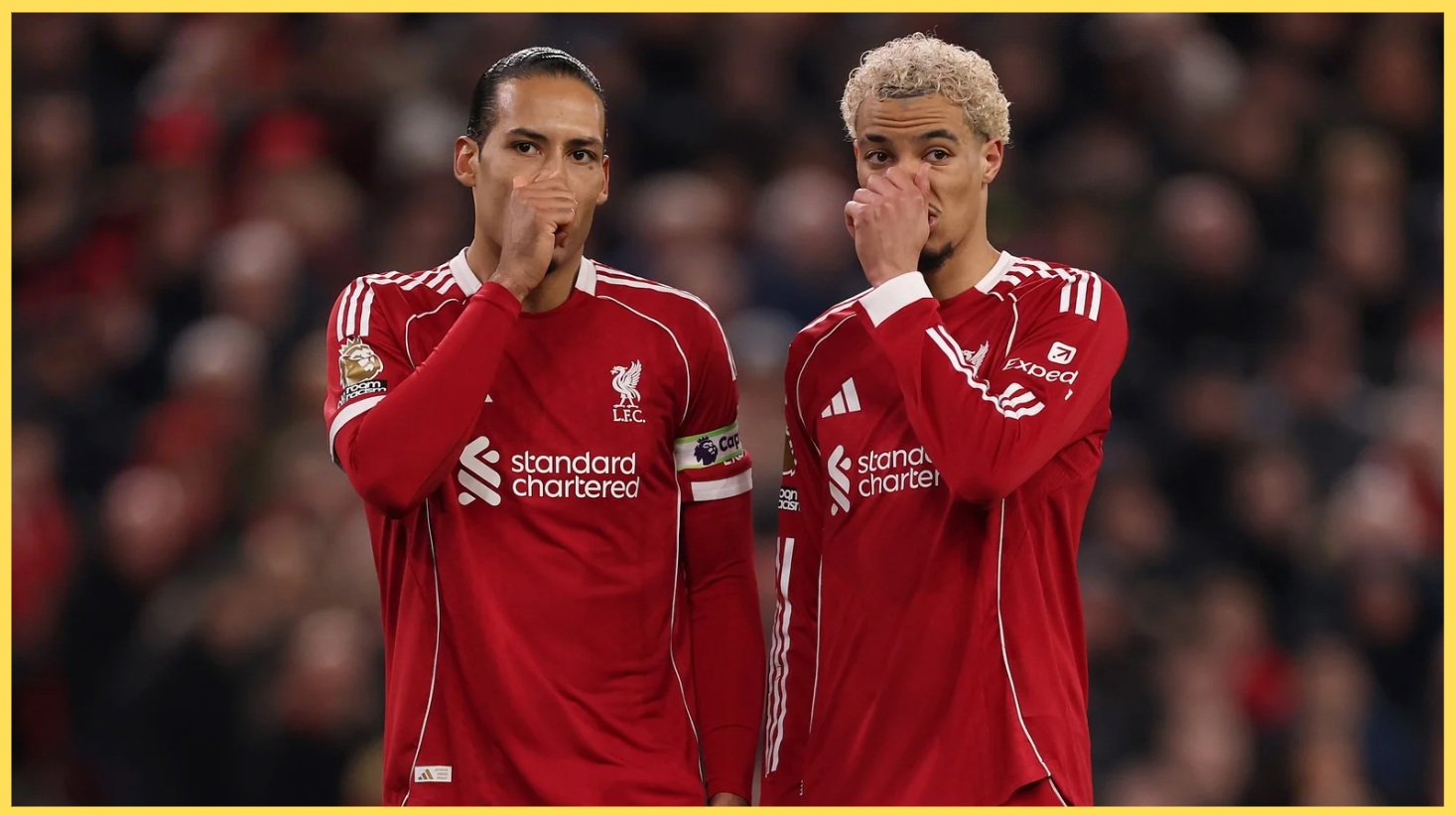 Virgil van Dijk and Hugo Ekitike share a few words during Liverpool's defeat to Manchester City