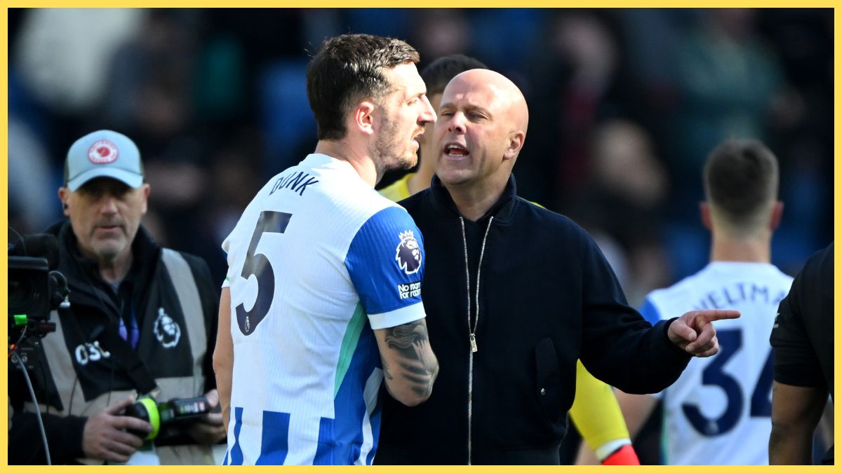 Arne Slot talks with Brighton player during Liverpool game.