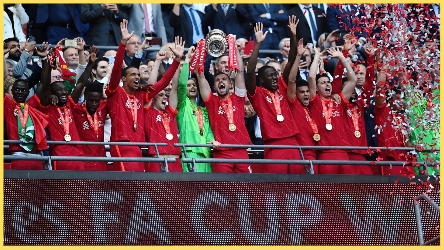 Liverpool players celebrate winning the FA Cup in 2022