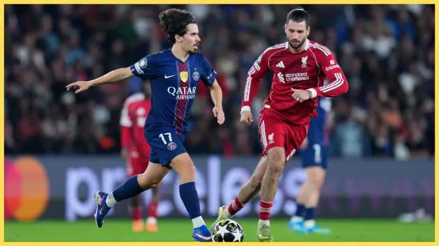 Vitinha of Paris Saint-Germain runs with the ball while under pressure from Dominik Szoboszlai of Liverpool during the UEFA Champions League 2025/26 Quarter-Final First Leg match between Paris Saint-Germain FC and Liverpool FC at Parc des Princes