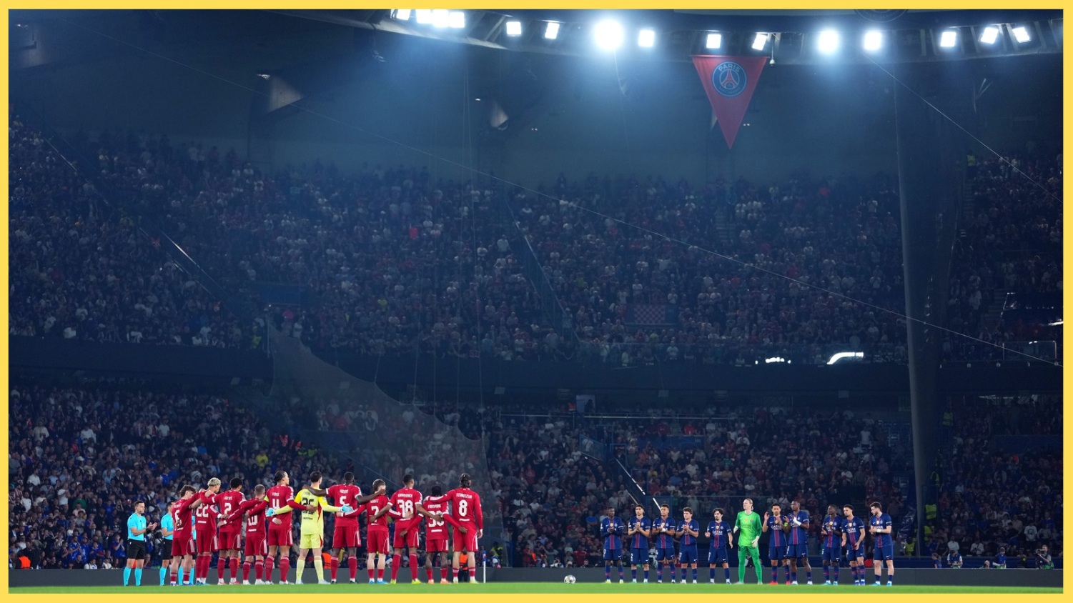 Liverpool and PSG players observe a minute's silence before their Champions League game