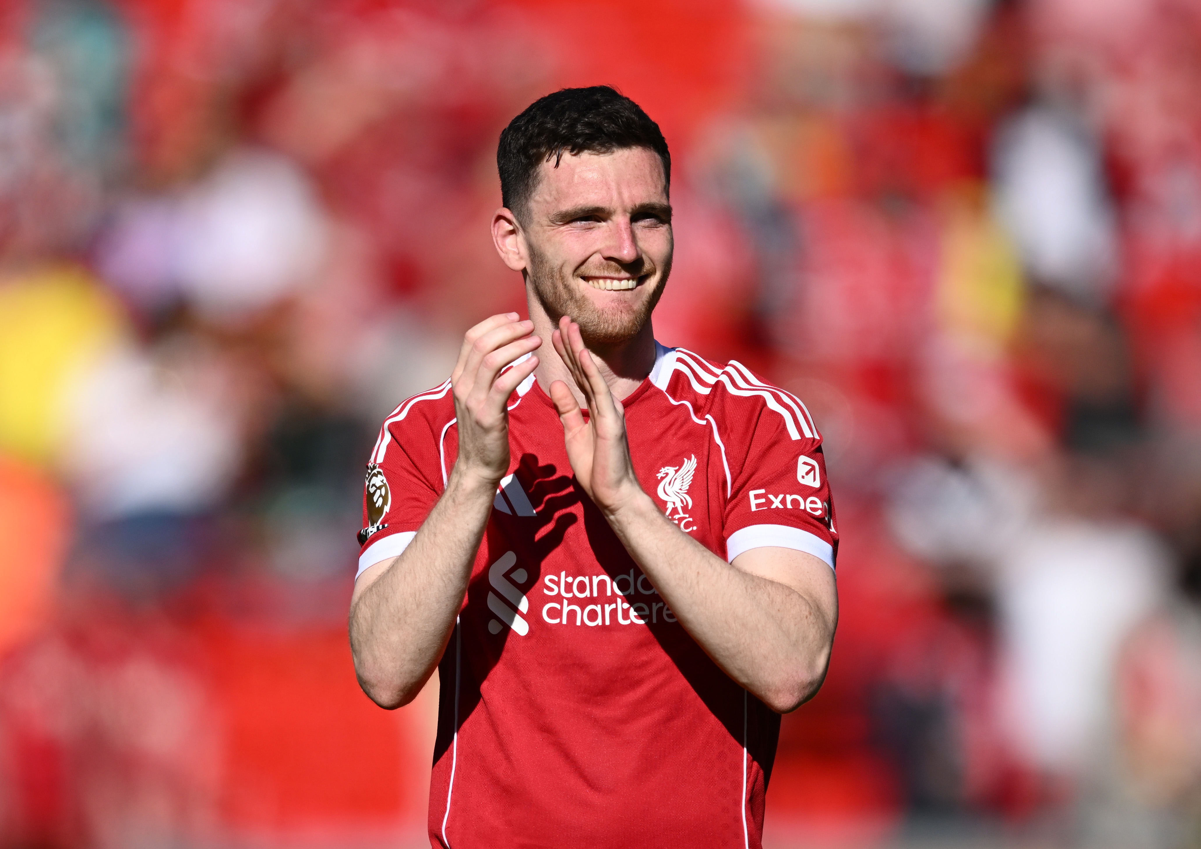 Andy Robertson applauds after Liverpool's win over Crystal Palace on Saturday