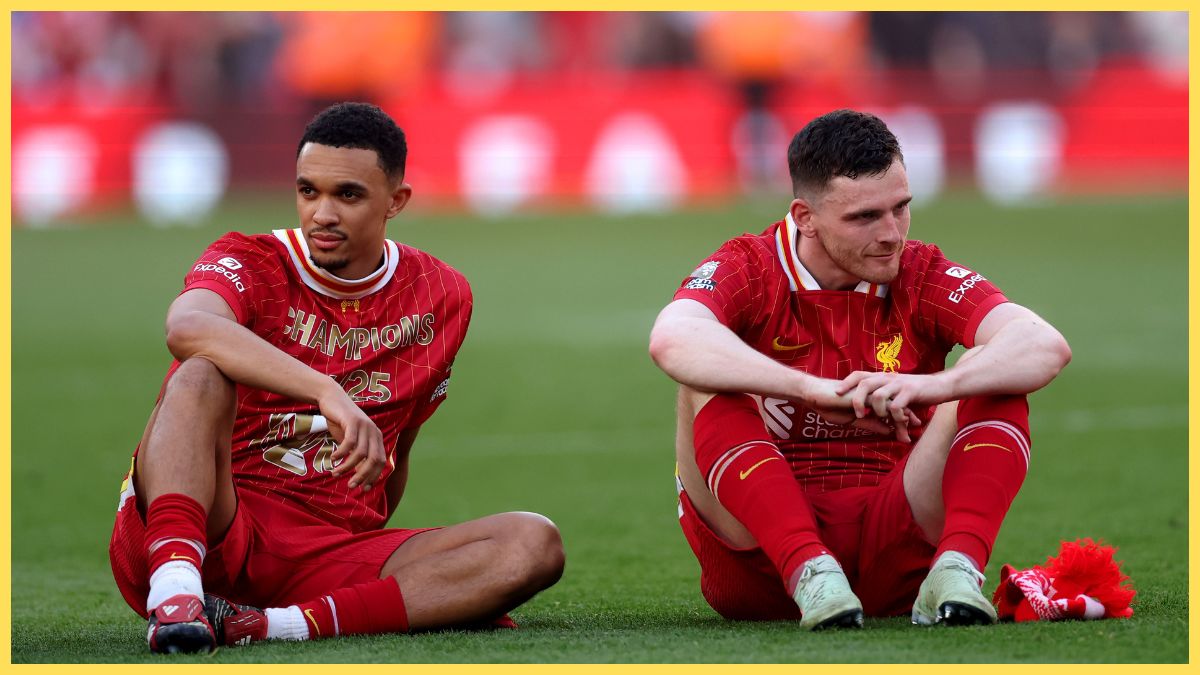 Trent Alexander-Arnold and Andrew Robertson of Liverpool look on, as they celebrate the teams victory and confirmation of winning the Premier League title after the Premier League match between Liverpool FC and Tottenham Hotspur FC at Anfield