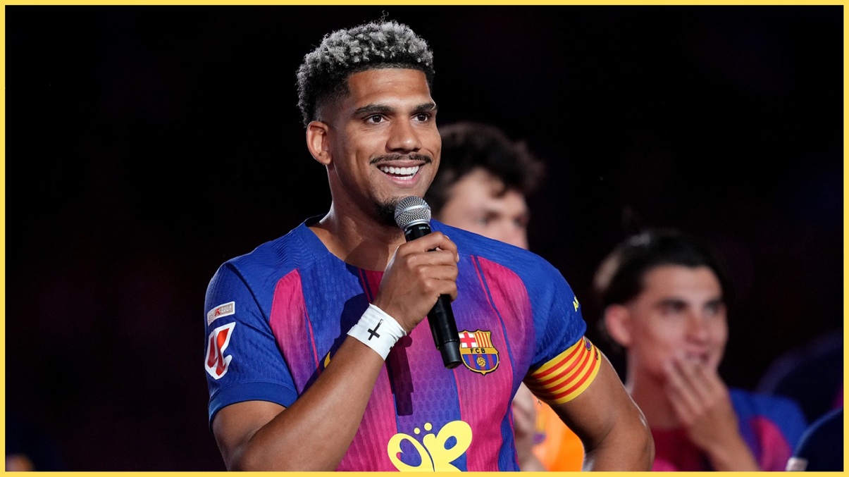 Ronald Araujo speaks to Barcelona fans after winning LaLiga in May