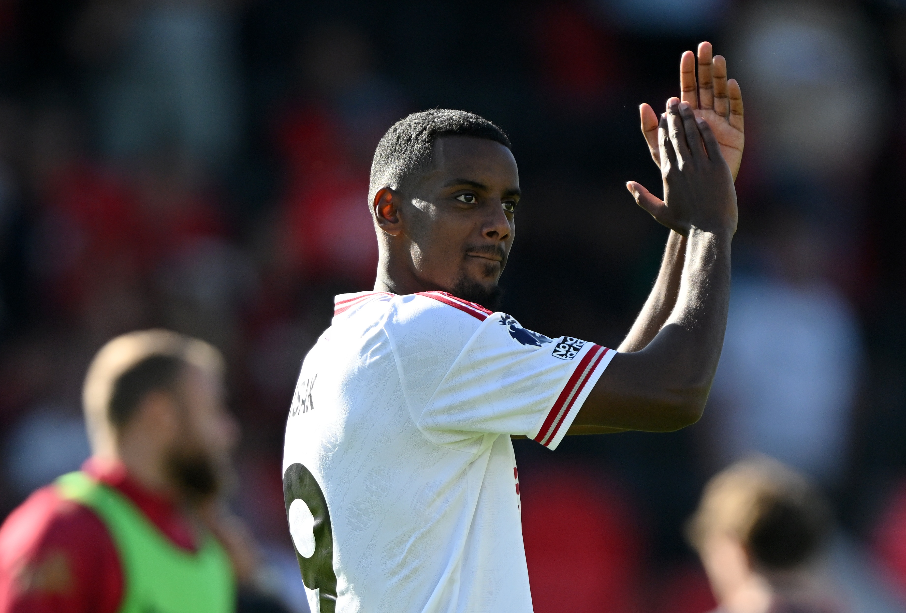 Liverpool striker Alexander Isak claps his hands.