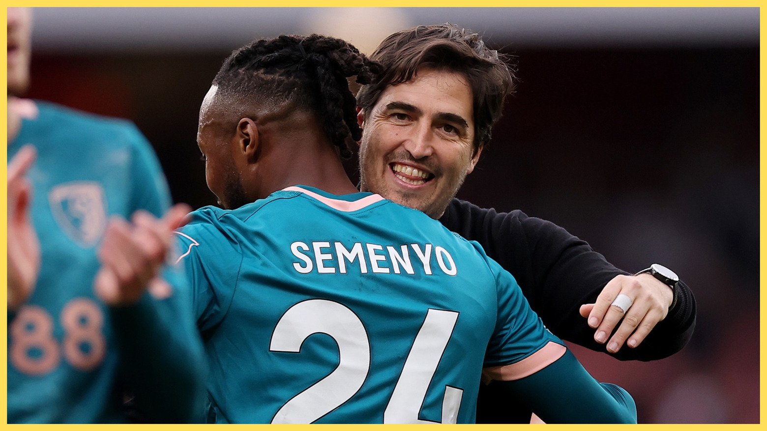 Liverpool manager Andoni Iraola hugs Man City winger Antoine Semenyo.