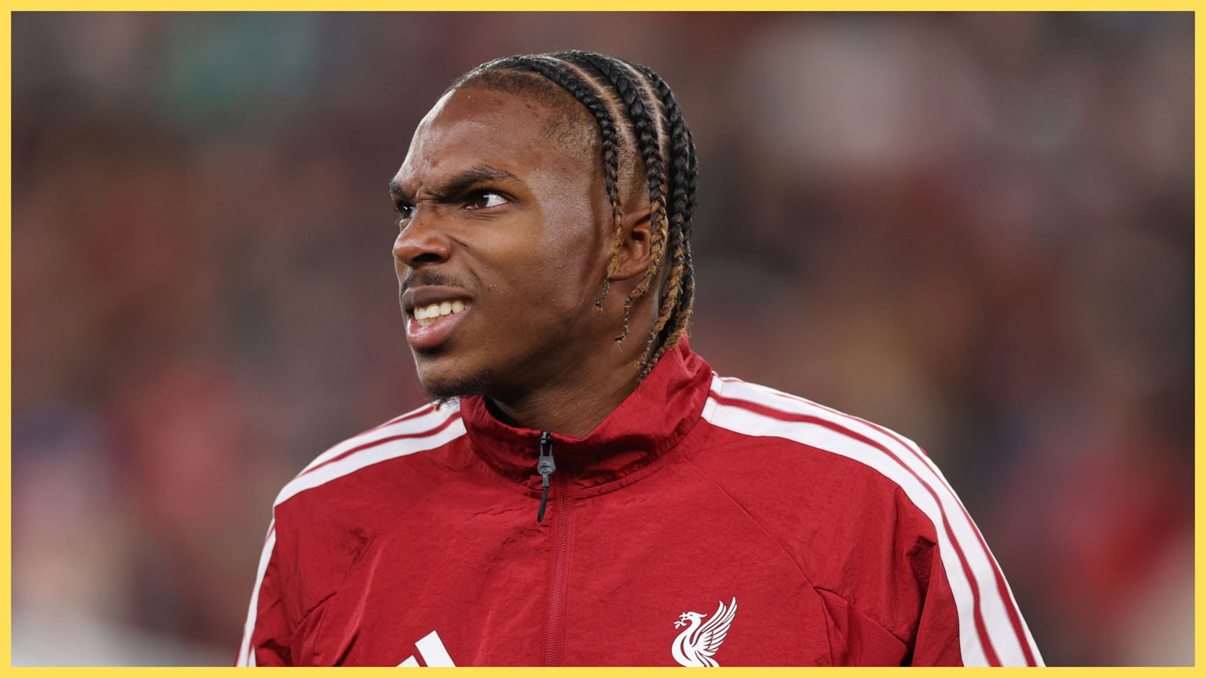 Liverpool centre-back Jeremy Jacquet grimaces ahead of Champions League game.