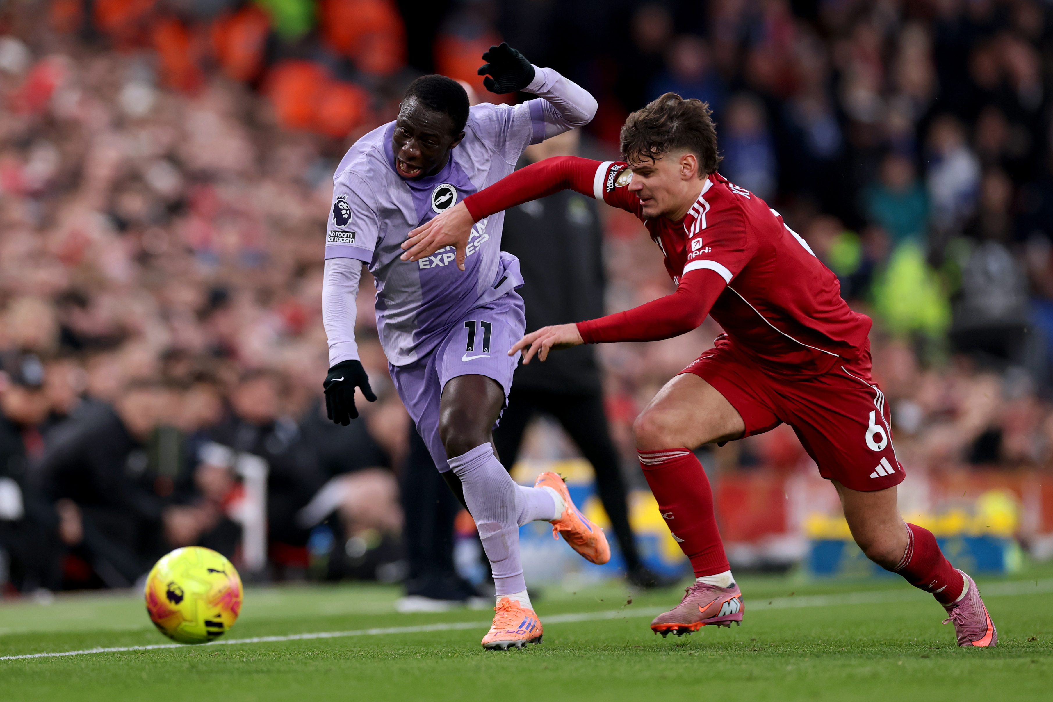 Yankuba Minteh dribbles past Liverpool fullback Milos Kerkez.