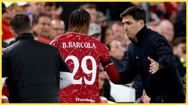 Liverpool manager Andoni Iraola shakes hands with Bradley Barcola.