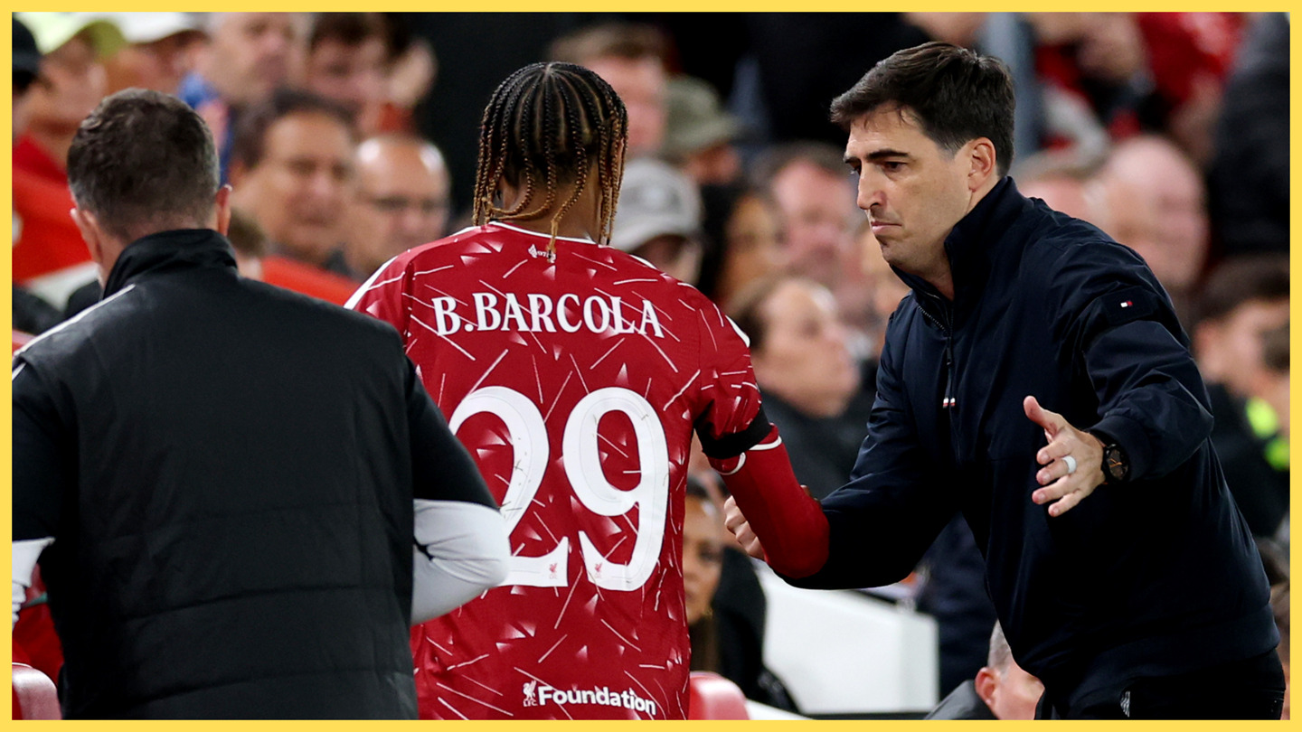 Liverpool manager Andoni Iraola shakes hands with Bradley Barcola.