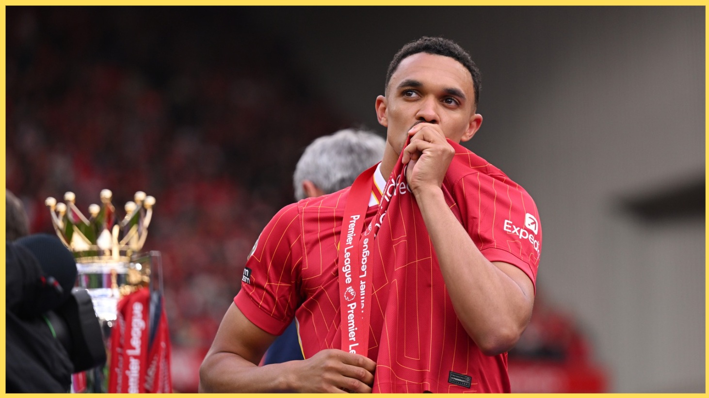 Trent Alexander-Arnold kisses his Premier League winner's medal