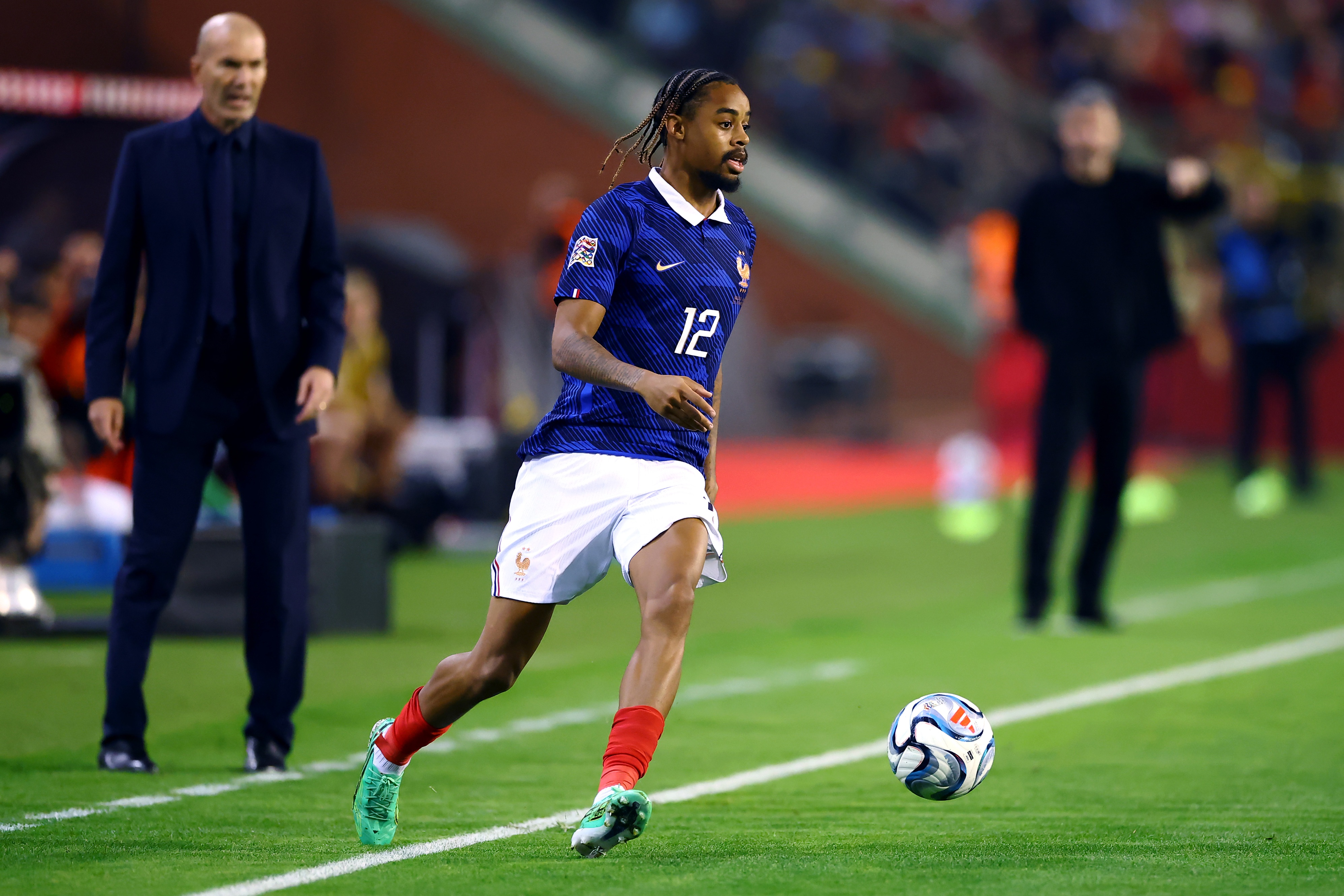 Liverpool winger Bradley Barcola dribbles with the ball during France game.