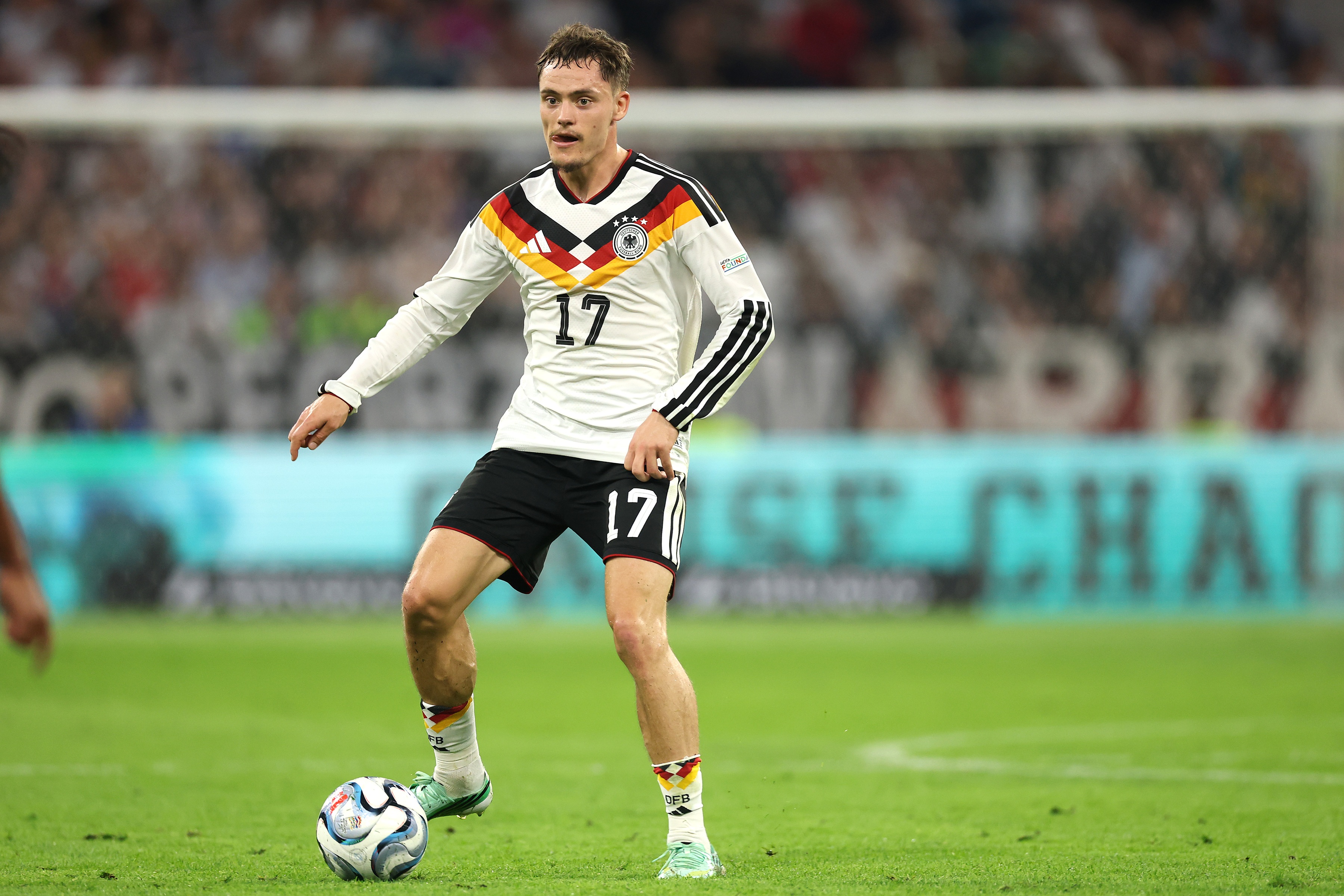Liverpool attacker Florian Wirtz dribbles with the ball during Germany game.
