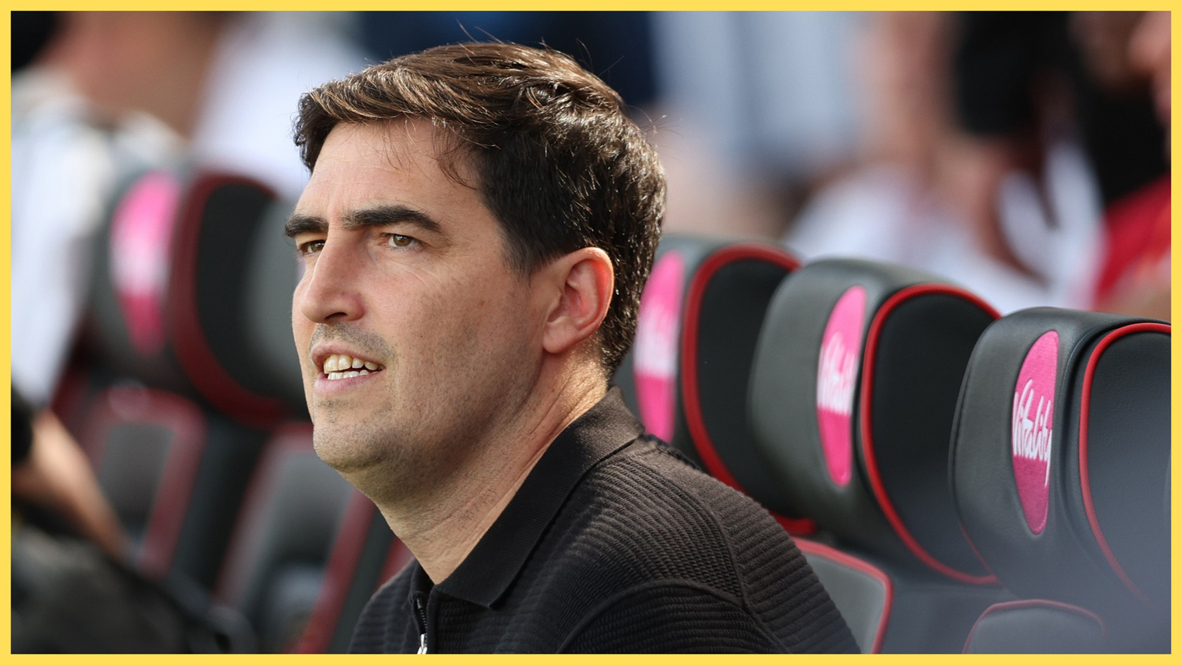Liverpool head coach Andoni Iraola looks on from the bench.