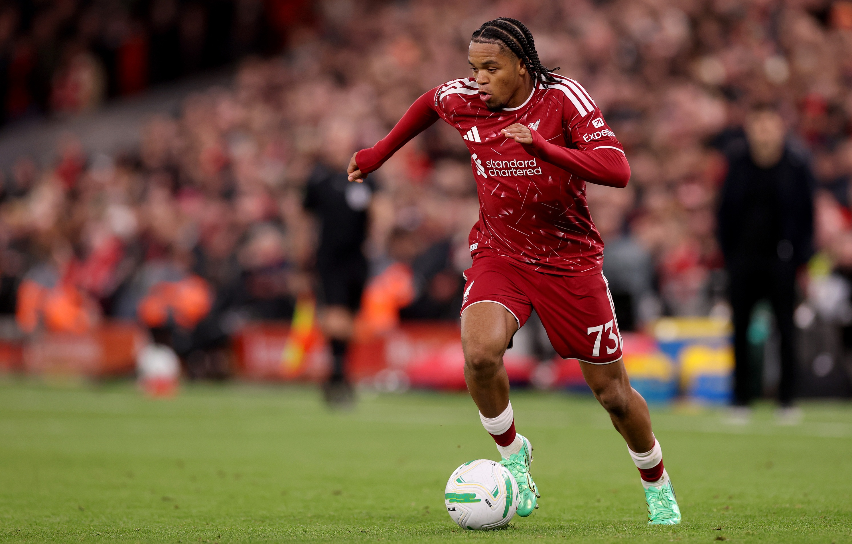 Rio Ngumoha dribbles during Liverpool game.