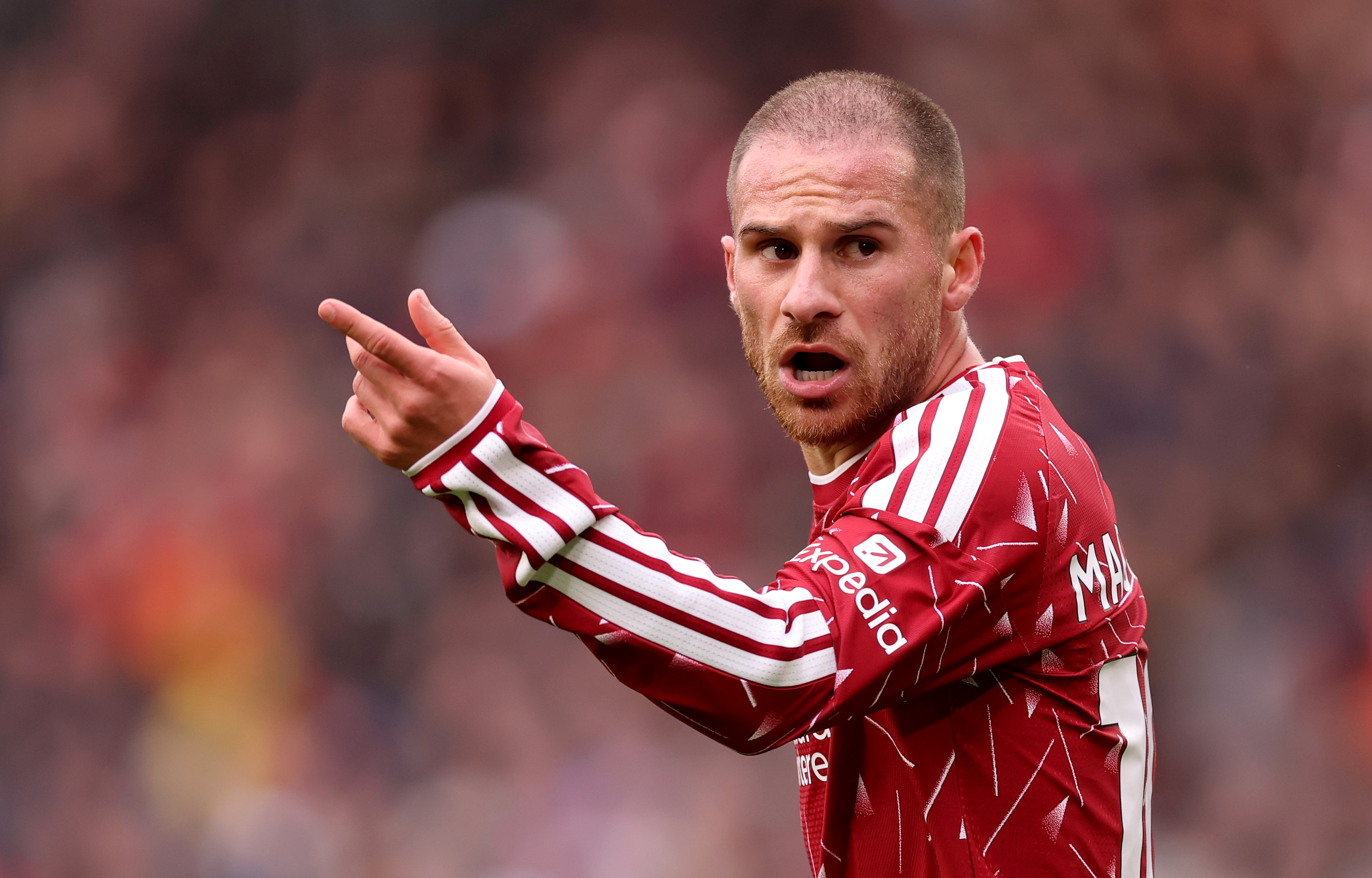 Alexis Mac Allister gestures during a Liverpool match
