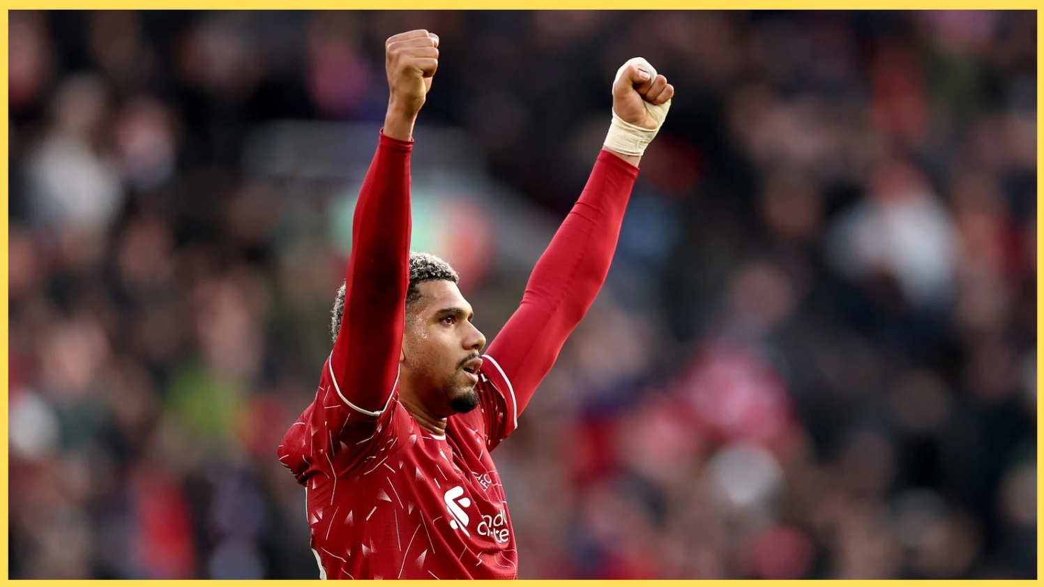 Ronald Araujo raises his arms in celebration